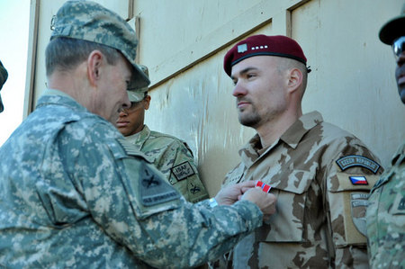 Staff Sergeant Novotny receives the Bronze Star Medal