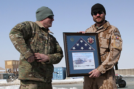 Staff Sergeant Michal Novotny with the BSM certificate