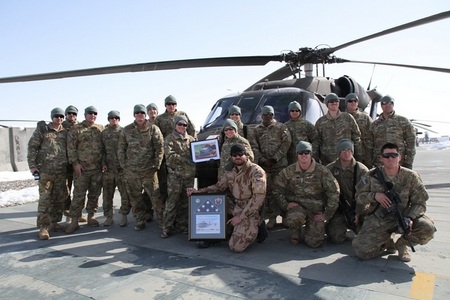Staff Sergeant Michal Novotny with American soldiers