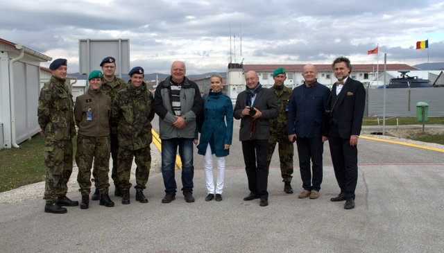 Deputies with soldiers at the Pristina base