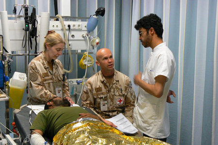 3CST: From the left: anesthetist Ludmila K., commander of 3rd CST LTC Dr. Michal Plodr, PhD, with a local interpreter 