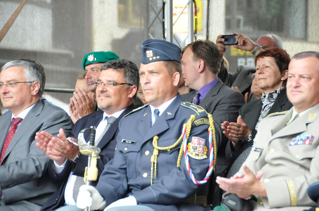Deputy Minister of Defence, Tomas Kuchta, (second from the left), watches the exhibition