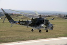  Vrtulník Mi-24V při startu