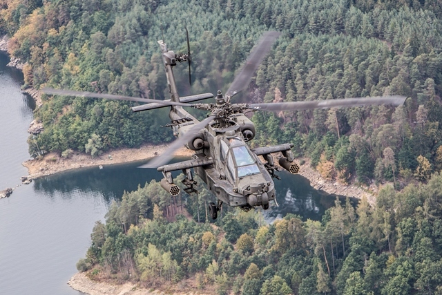 An AH-64 Apache over Dalesice reservoir