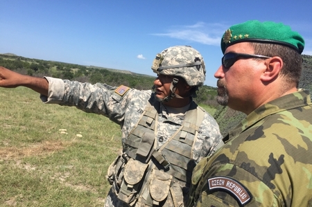 Colonel Pavel Lipka, Commander of the 7th Mechanised Brigade, being provided with details of the exercise