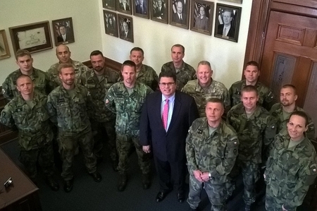 Rolando B. Pablos, Minister of the Texas Government, with members of the 7th Mechanised Brigade