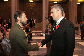 Minister Metnar congratulating Captain Viktor Patia, Commander of 10th Guard Company of the Resolute Support Mission in Afghanistan upon receiving the Cross of Merit for his excellent leadership