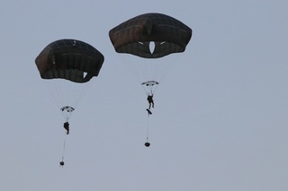 Paratroopers from Chrudim jumping using American parachutes