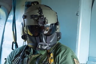 Palubní střelec ve vrtulníku Mi-171