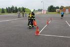 Přenesení dvou 20kg kanystrů po vytýčené trase (slalom mezi kužely)