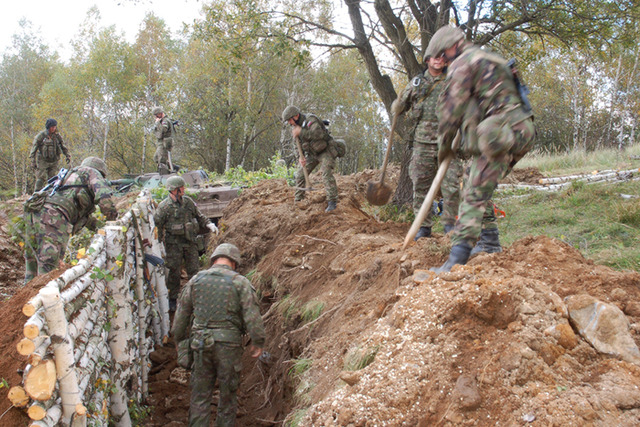 Slovak soldiers building a defence position