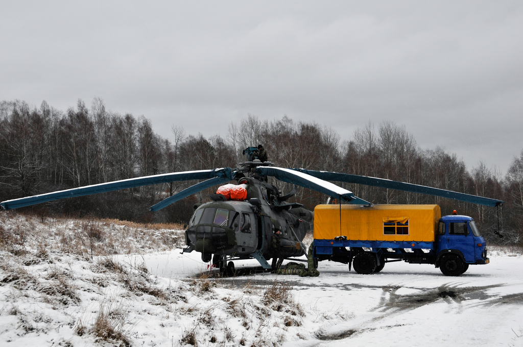 Getting the helicopter ready for take off at Boletice-Podvori area