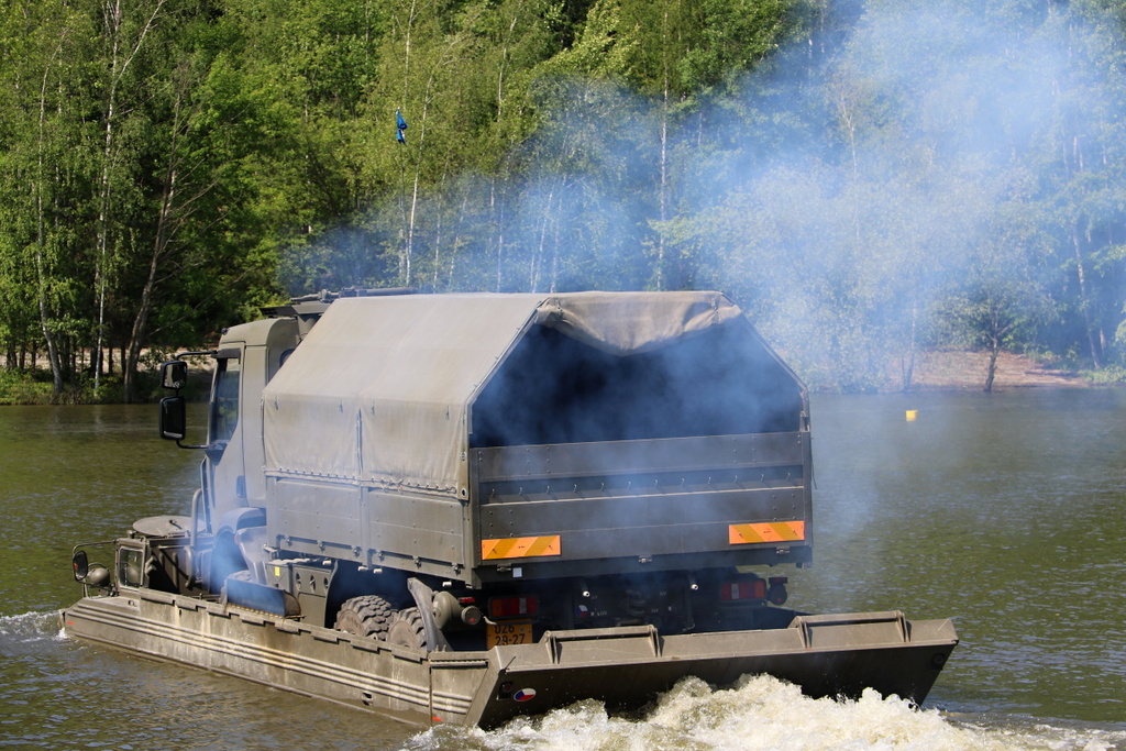 PTS-10 transporting a TATRA truck