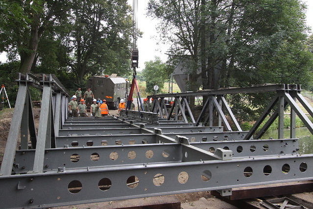 This is not an exercise = soldiers at Chlum u Sedlcan assemble the last of six temporary bridges in the aftermath of June floods