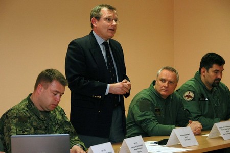 First Deputy Minister of Defence Jiri Sedivy (standing) and Brigadier General Bohuslav Dvorak (second from the right)