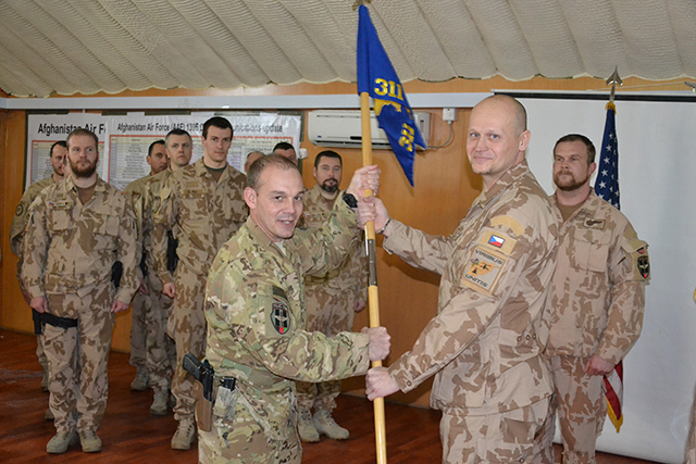 Major Chrobak accepting the flag of the 311th Squadron