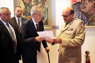 President Milos Zeman presenting the photo of T. G. Masaryk and his grandfather to Colonel Ales Knizek, Director of the Military History Institute