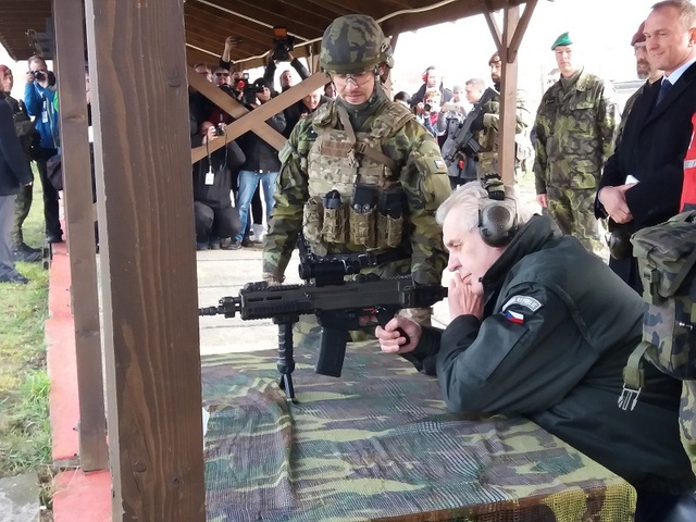 President firing from a CZ 805 BREN rifle