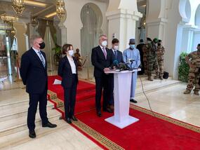 With the media after the meeting.