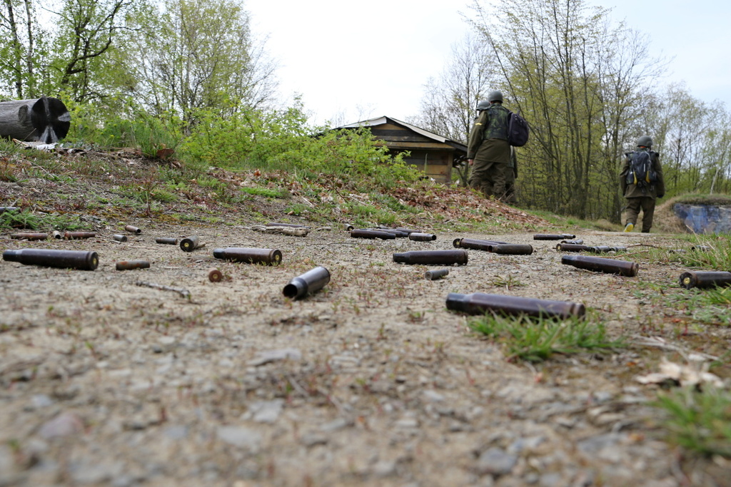 Leftover cartridges from recent fighting in the village