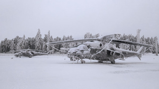 Vrtulník Mi-24 ve speciální ochranné plachtě 